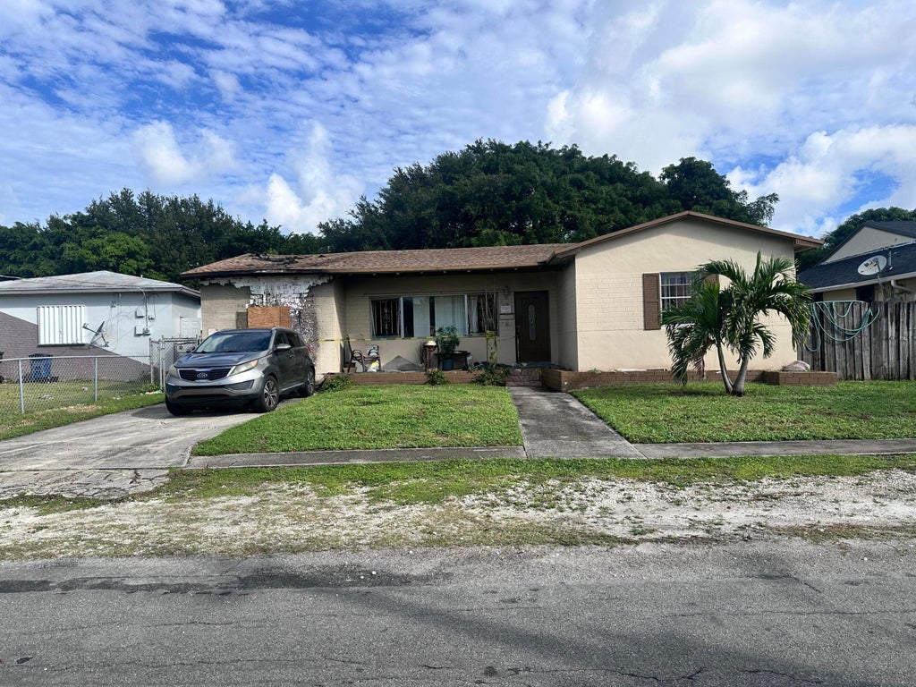 Photo of 712 NW 9TH Court NW, Hallandale Beach, FL 33009 (MLS # B26093434)