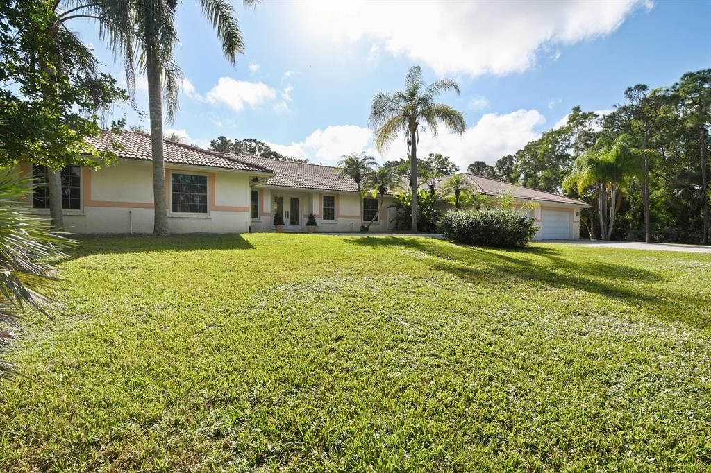 Photo of 18800 SE Crosswinds Lane SE, Jupiter, FL 33478 (MLS # R10637614)