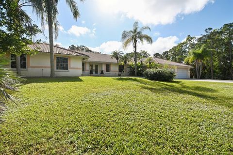 Photo of 18800 SE Crosswinds Lane SE, Jupiter, FL 33478 (MLS # R10637614)