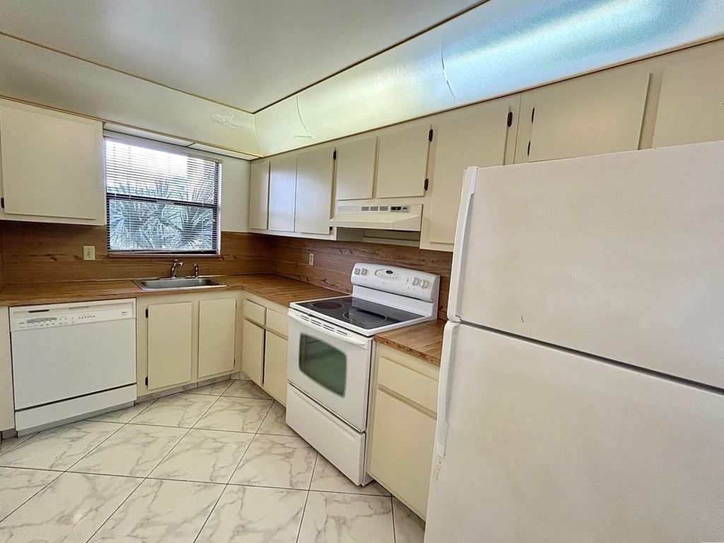 Photo of 4700 Lucerne Lakes Boulevard W #407, Lake Worth, FL 33467 (MLS # R11146500)