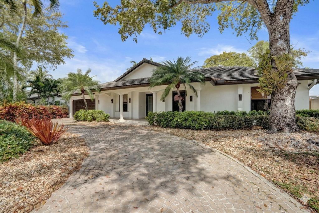 Photo of 9721 Sea Turtle Drive, Plantation, FL 33324 (MLS # B26009469)