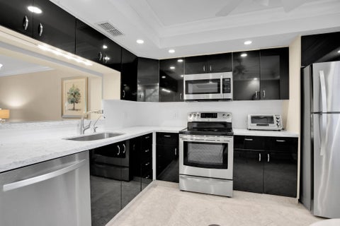 Photo of 3303 Aruba Way #N1, Coconut Creek, FL 33066 (MLS # B26081761)
