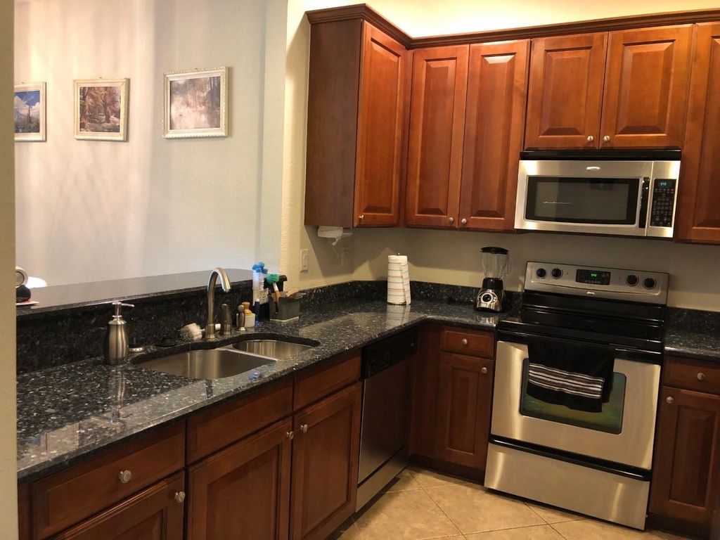 Photo of 1551 SE Wilshire Place #101, Stuart, FL 34994 (MLS # R11141165)