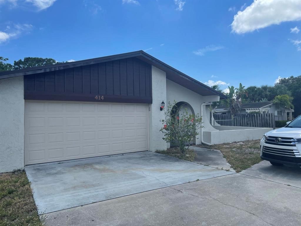 Photo of 414 SE Port St Lucie Boulevard, Port Saint Lucie, FL 34984 (MLS # R10807691)