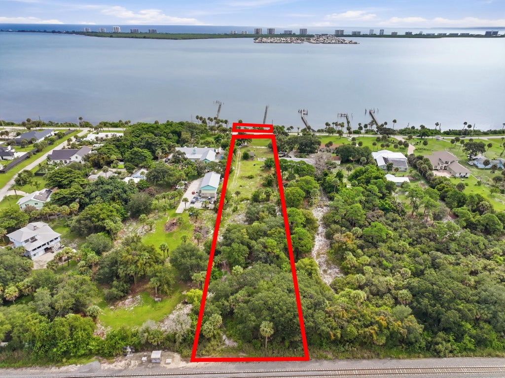 Photo of 12825 S INDIAN RIVER Drive, Jensen Beach, FL 34957 (MLS # B26079396)