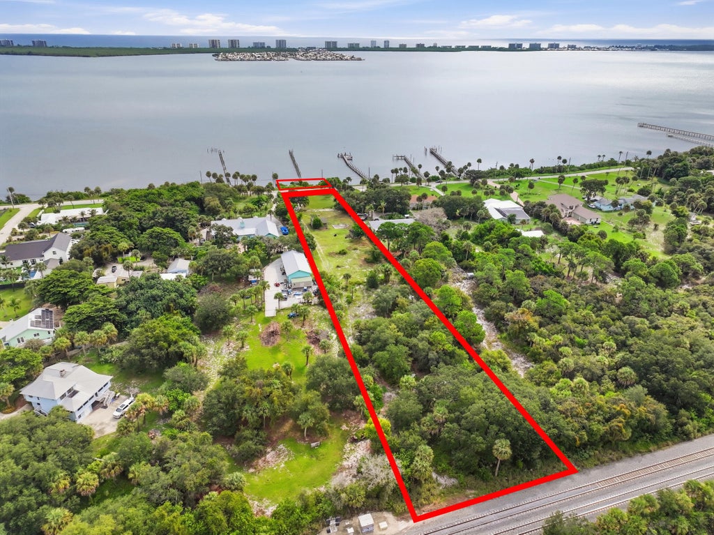 Photo of 12825 S INDIAN RIVER Drive, Jensen Beach, FL 34957 (MLS # B26079396)