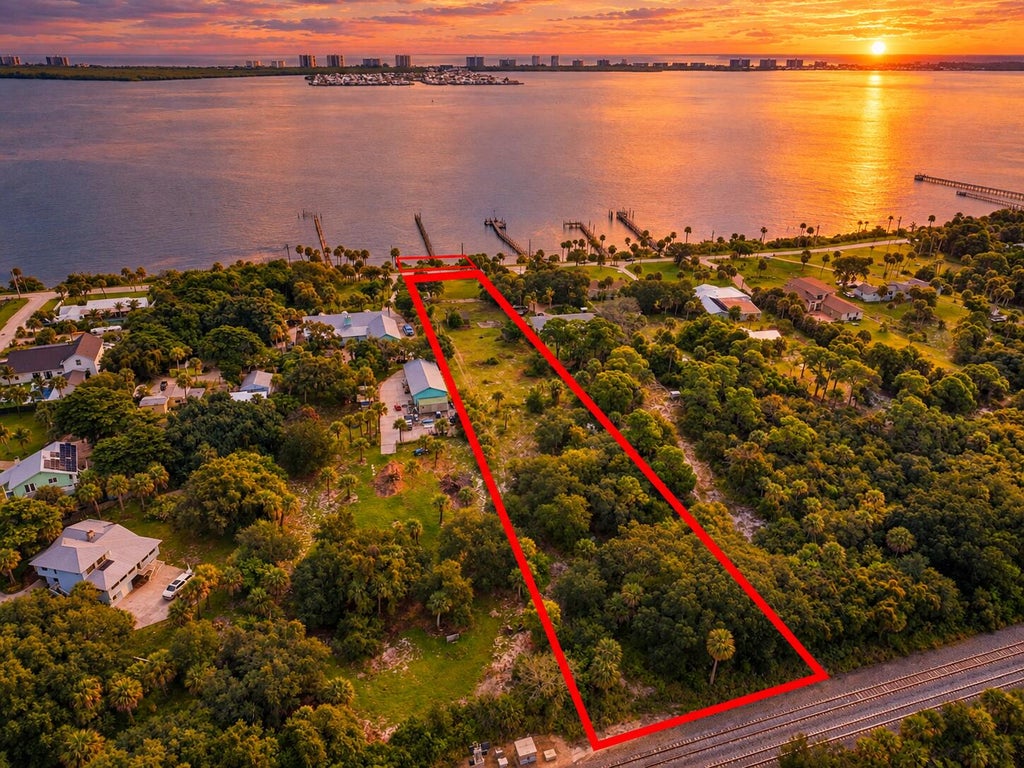 Photo of 12825 S INDIAN RIVER Drive, Jensen Beach, FL 34957 (MLS # B26079396)