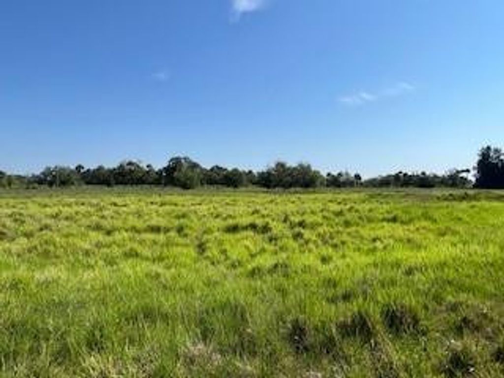 Photo of 993 S Header Canal Road, Fort Pierce, FL 34945 (MLS # F10442771)
