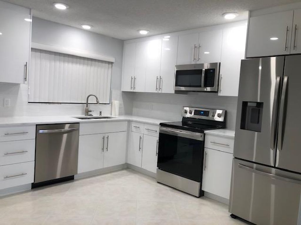 Photo of 110 Old Meadow Way, Palm Beach Gardens, FL 33418 (MLS # R10970224)