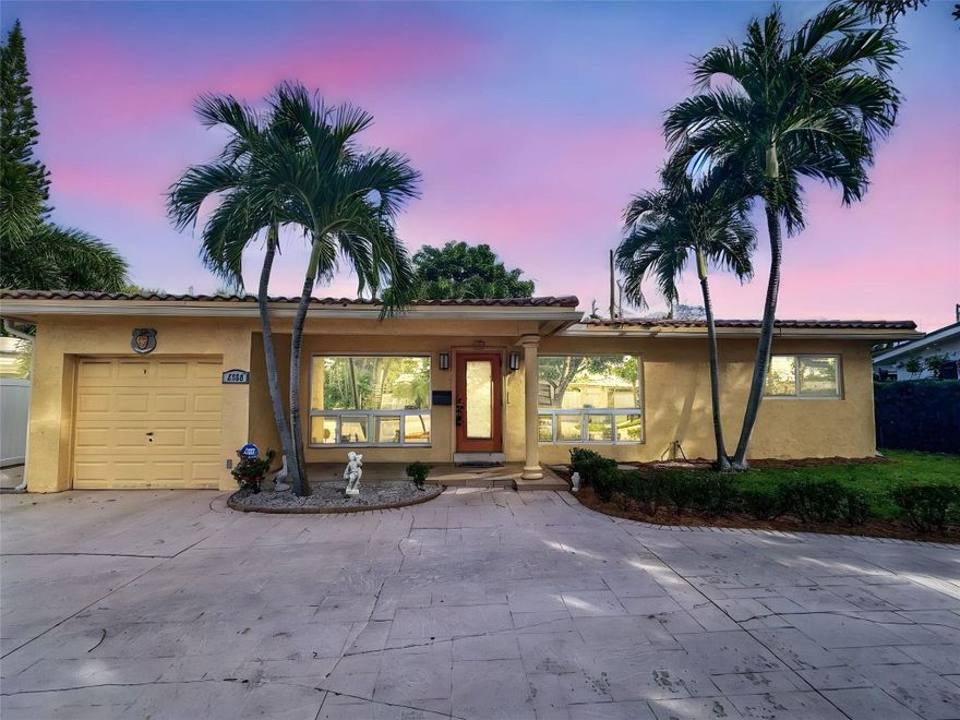 New barrel tile roof just installed and a $40k price reduction! - Well-maintained 3-bedroom, 3-bath home located in the desirable Jenada Villas neighborhood of Wilton Manors. This residence features a circular driveway, private fenced-in backyard, separate large storage shed, 1-car garage, and a functional layout with tile flooring throughout and abundant natural light. The kitchen offers wood cabinetry, granite countertops, and stainless steel appliances. Bright living spaces flow to a private backyard with a paved patio, ideal for entertaining or relaxing. Large separate laundry/utility room. Conveniently located near major roadways, shopping, and dining.  Ready for your updates.
