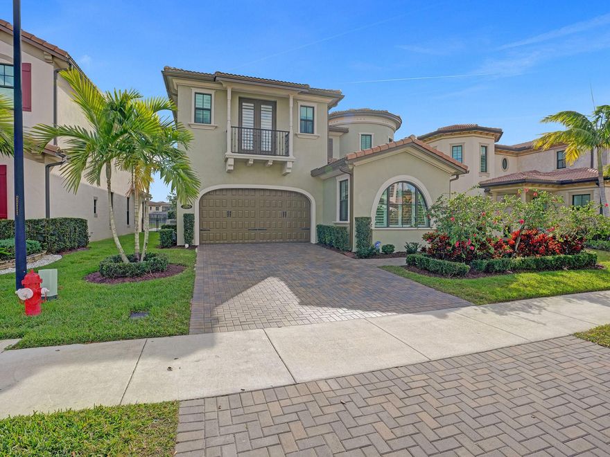 Gorgeous Strathmore with additional den option on first floor plus 5 Bedrooms and 5.5 baths and loft. Stunning over 22 foot glass windows from floor to ceilings in Great room! Amazing chefs’ kitchen with expansive island. Home is ideally located on the beautiful lake, north facing and close to back gate for easy residents access to your home. This home is superbly upgraded with elegant lighting and window treatments.  Large primary suite with sitting area. Very generous sized upstairs loft. Enjoy the tranquil lake view from your 1st or 2nd floor screened balcony.  Amazing gated community; resort-style amenities, including gym, tennis, ballroom, dog park and 24 hour manned and lower HOA dues than neighboring communities.