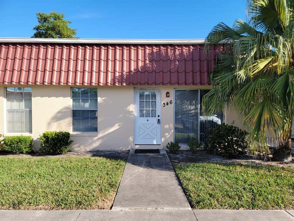 Photo of 346 Covered Bridge Boulevard Blvd, Lake Worth Beach, FL 33467 (MLS # R10761313)