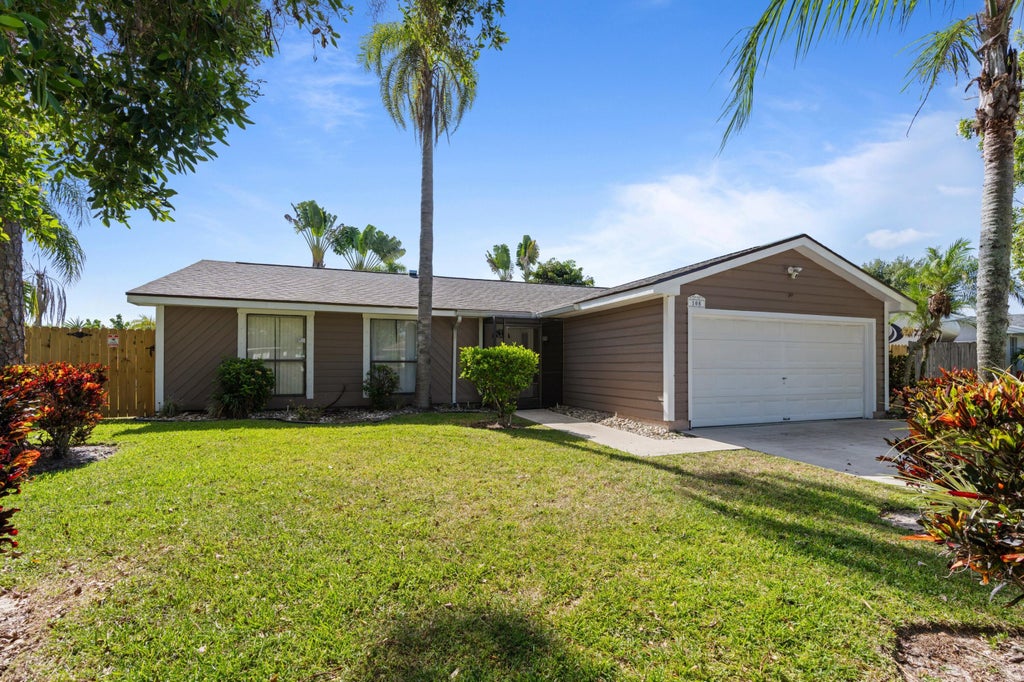 Photo of 108 Cambridge Lane, Royal Palm Beach, FL 33411 (MLS # B26066799)