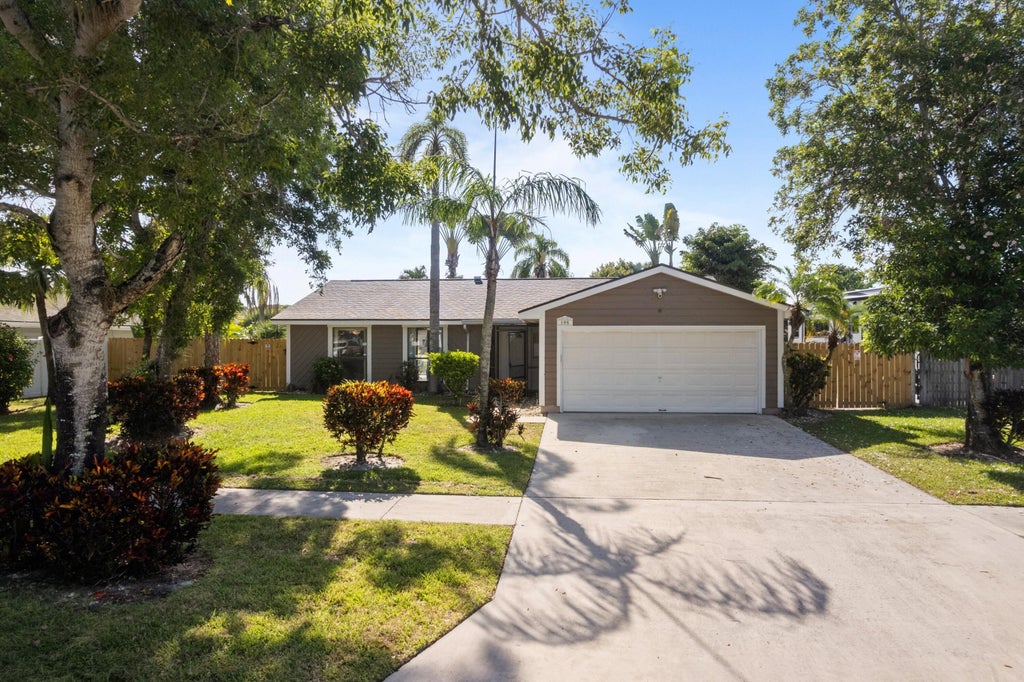 Photo of 108 Cambridge Lane, Royal Palm Beach, FL 33411 (MLS # B26066799)