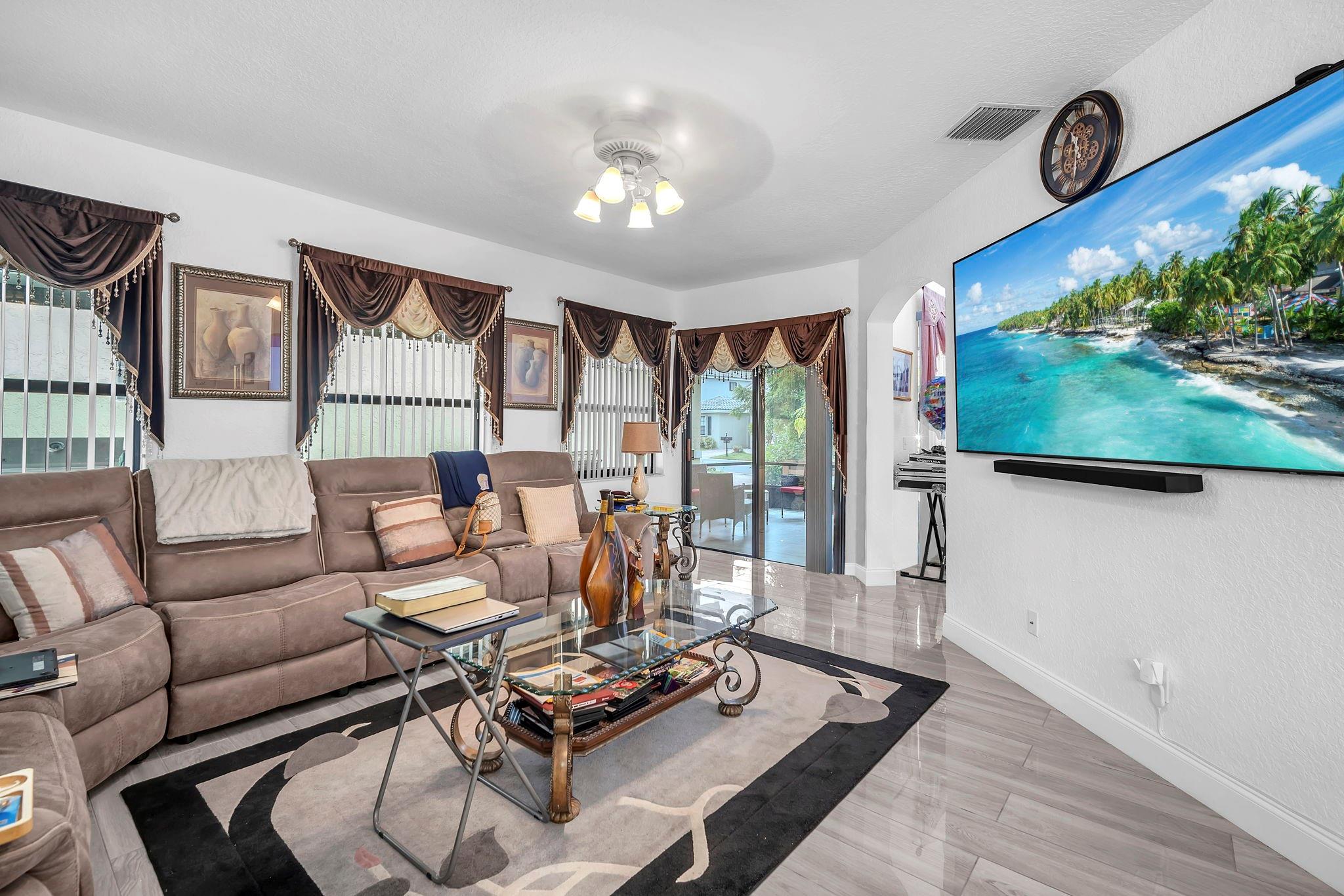 Lovely upgraded 4 bedrom and 3 full baths with 2 car garage home in French Quarters, Coral Springs near shops, restaurants, entertainment, minutes away from the beach, and A rated schools. You will enjoy the upgraded kitchen, new tiled floor, new water heater and with beautiful new light fixtures. Enjoy the quiet neighborhood with your family.