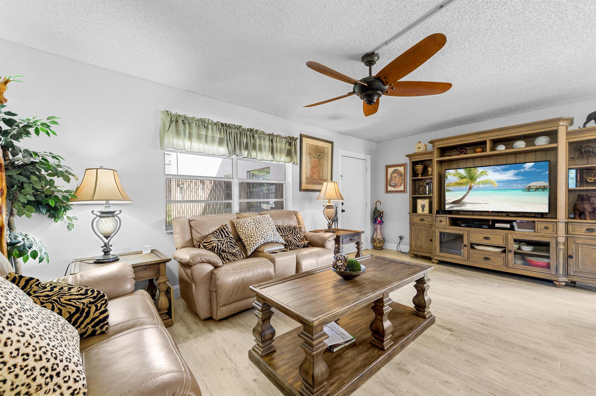 Welcome to this gorgeous ground-floor 1 bed, 1.5 bath condo available for seasonal or yearly rental. This completely furnished unit features an open kitchen with stainless steel appliances, ceramic tile flooring throughout, and a washer and dryer inside the unit. Located in the highly desirable 55+ community of Kings Point, residents enjoy resort-style amenities including multiple clubhouses, indoor and outdoor pools, golf courses, tennis and pickleball courts, fitness center, live entertainment theater, courtesy shuttle service, cafe and bistro, billiards room, card and game rooms, art and craft studios, library, 24-hour gated security, and so much more. Experience South Florida living at its finest!