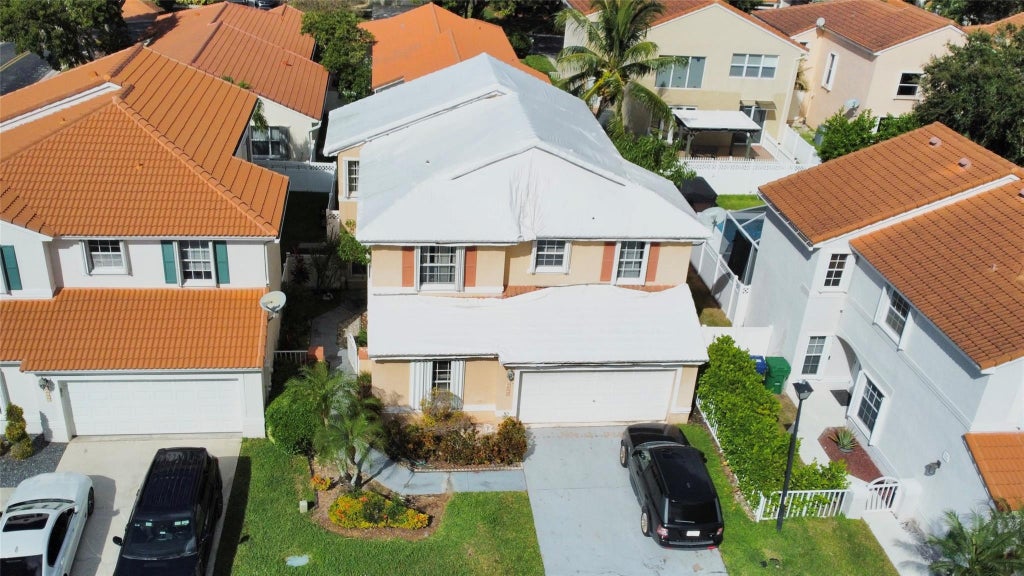 Photo of 11058 NW 46th Drive, Coral Springs, FL 33076 (MLS # F10536238)