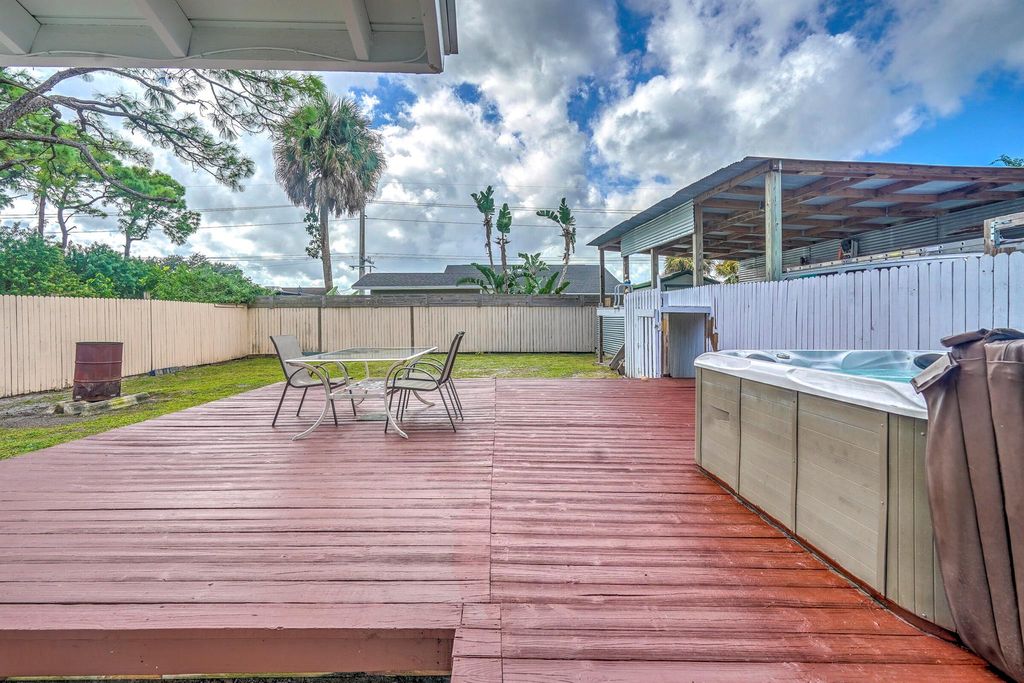 Photo of 3419 W Lake Drive, Fort Pierce, FL 34982 (MLS # R11134879)