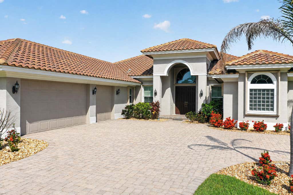 Photo of 9431 Meadowood Drive, Fort Pierce, FL 34951 (MLS # B26046814)