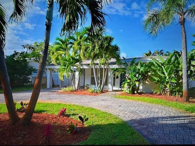 Available September 2025 Beautiful 3BR/2BA Home with Heated Pool in Lloyd's Estates! This stunning, spacious single-family home will be ready for new tenants in September 2025! Currently occupied showings by appointment only. Located in the desirable Lloyd's Estates neighborhood, just minutes from supermarkets, gyms, shopping, and more, this 3-bedroom, 2-bath home offers comfort, style, and convenience. Primary suite features a private bathroom 2nd + 3rd Bedroom access Jack & Jill bath. Modern white high-gloss kitchen with quartz countertops and island, open to the dining area. High-impact windows and sleek porcelain floors throughout. Screened-in patio overlooking the heated pool and large fenced backyard perfect for relaxing or entertaining. TENANT OCCUPIED SHOWINGS BY APPOINTMENT ONLY