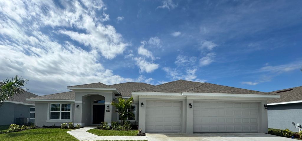 Photo of 8729 Waterstone Boulevard, Fort Pierce, FL 34951 (MLS # R10969049)