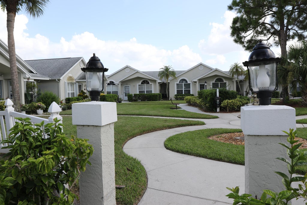 Photo of 1160 NW Lombardy Drive, Port Saint Lucie, FL 34986 (MLS # B26043378)