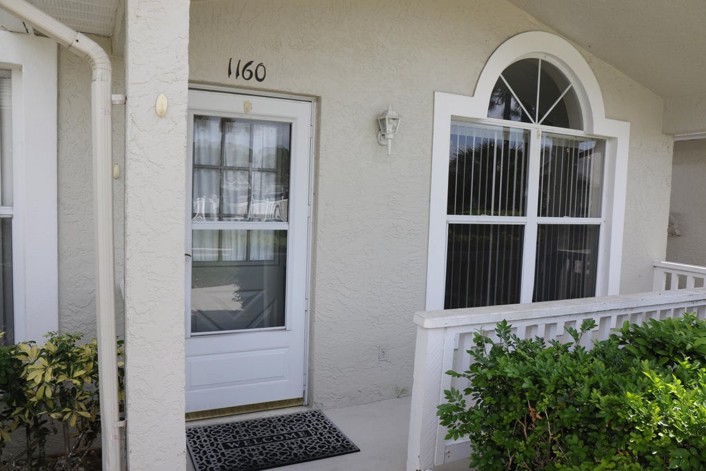 Photo of 1160 NW Lombardy Drive, Port Saint Lucie, FL 34986 (MLS # B26043378)