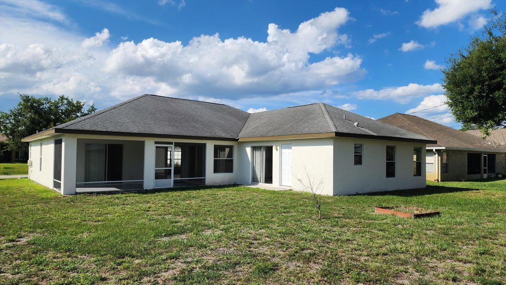Photo of 474 SW Namoit Place, Port Saint Lucie, FL 34953 (MLS # B26028966)