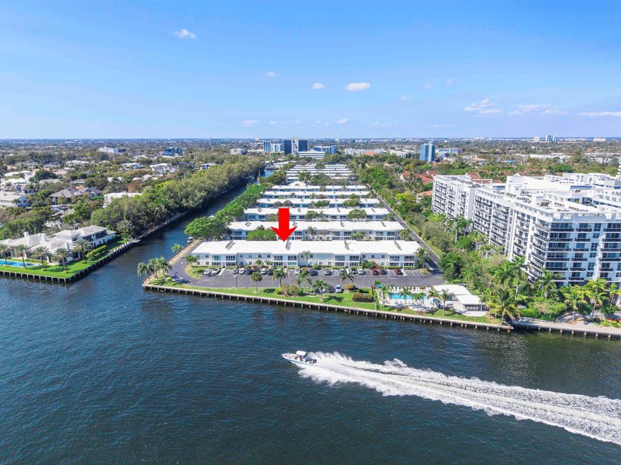 Renovated 2BR/2BA waterfront condo offering elevated Intracoastal living with ocean-access dockage for boats up to 50 ft. Enjoy peaceful canal views from the enclosed balcony with reflective tint and power smart shades. Interior features tile and wood floors, impact windows, and smart LED lighting throughout. Updated kitchen and spa-style baths include a spacious primary suite with dual vanities and LED smart mirrors. In-unit washer/dryer, extra storage, new A/C and water heater, plus fire-rated doors and soundproofing add comfort and security. Resort-style amenities include 4 pools, pickleball, tennis, and 2 fitness centers.