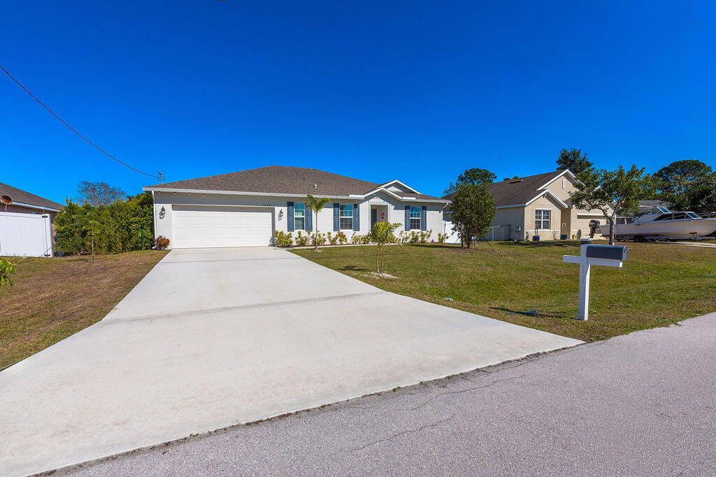 Photo of 1025 SW Sarto Lane, Port Saint Lucie, FL 34953 (MLS # R11159600)