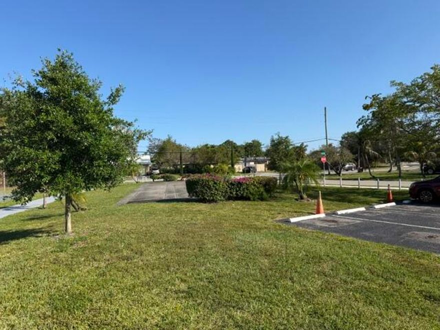 Beautiful nicely updated 3 bedroom and 2 bathroom , corner unit villa with plenty of parking. Huge back yard perfect to entertain or add a pool overlooking canal front. This corner unit villa is in the heart of everything including main roads and short drive to the beach.