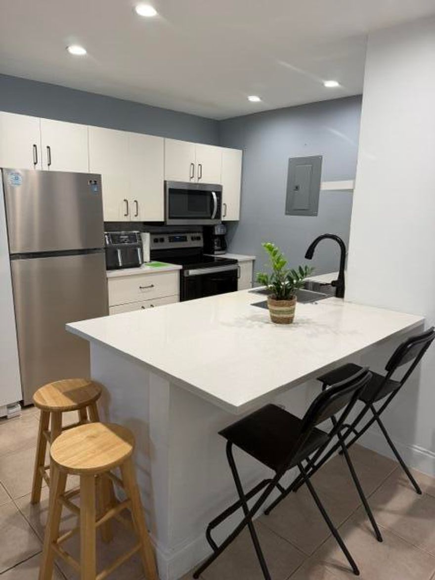 Beautiful nicely updated 3 bedroom and 2 bathroom , corner unit villa with plenty of parking. Huge back yard perfect to entertain or add a pool overlooking canal front. This corner unit villa is in the heart of everything including main roads and short drive to the beach. Some pictures have been virtually staged.