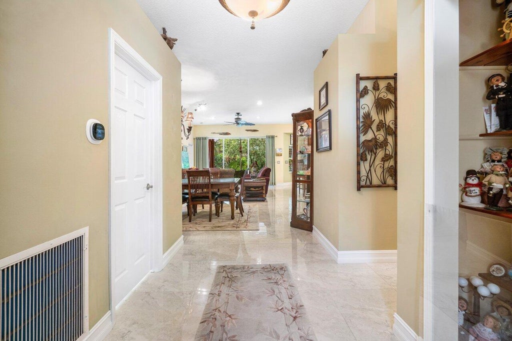 Photo of 4921 SE Devenwood Way, Stuart, FL 34997 (MLS # R11002628)
