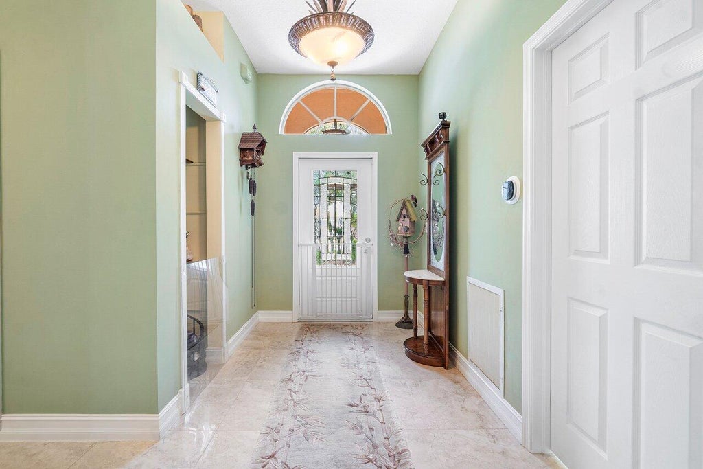 Photo of 4921 SE Devenwood Way, Stuart, FL 34997 (MLS # R11002628)