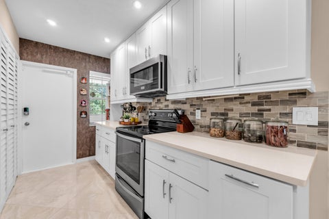Tiny photo for 3201 N COURSE Lane E #212, Pompano Beach, FL 33069 (MLS # B26069493)