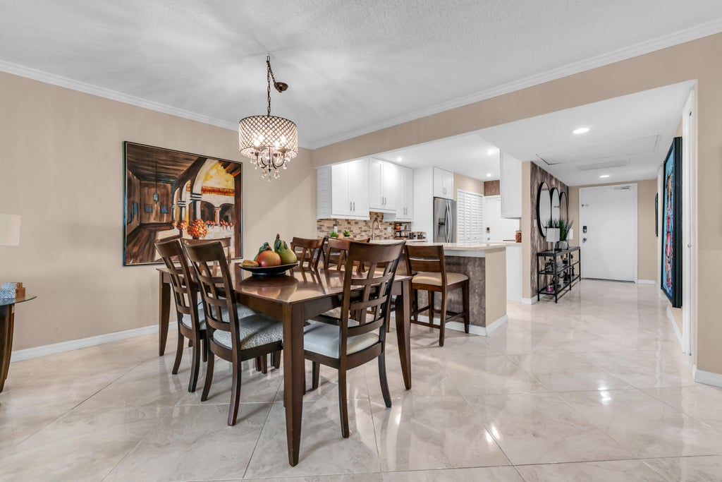 Photo of 3201 N COURSE Lane E #212, Pompano Beach, FL 33069 (MLS # B26069493)