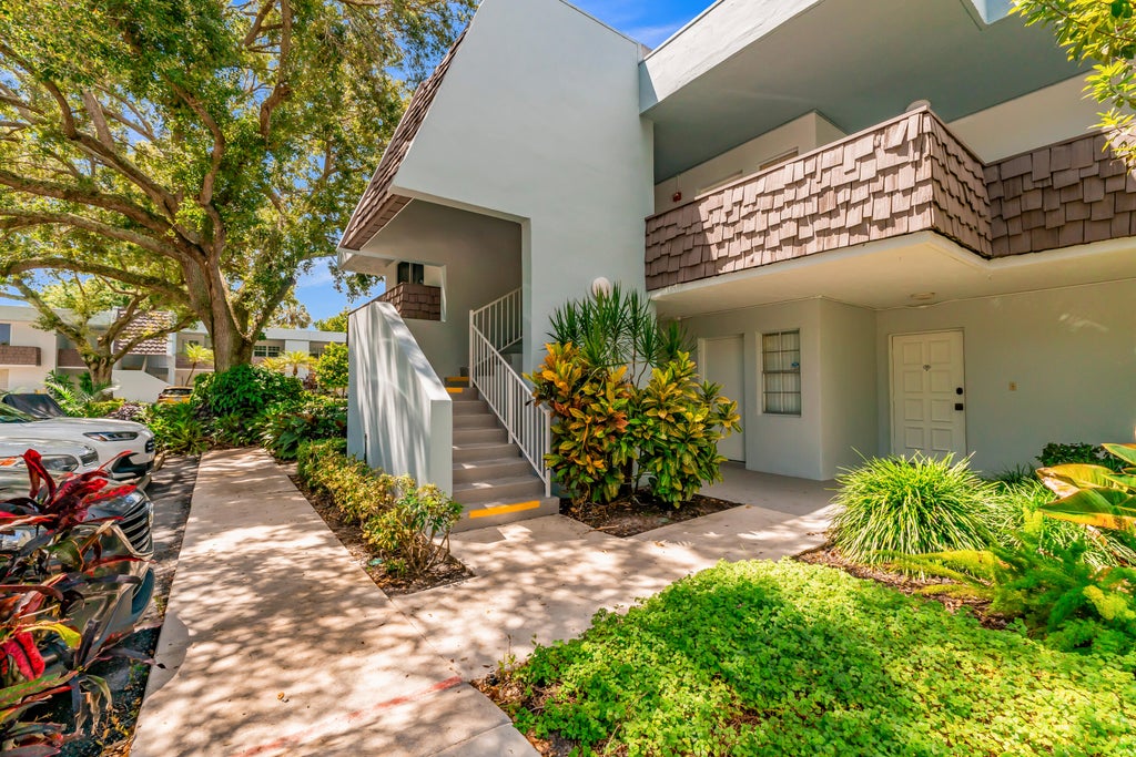 Photo of 3201 N COURSE Lane E #212, Pompano Beach, FL 33069 (MLS # B26069493)