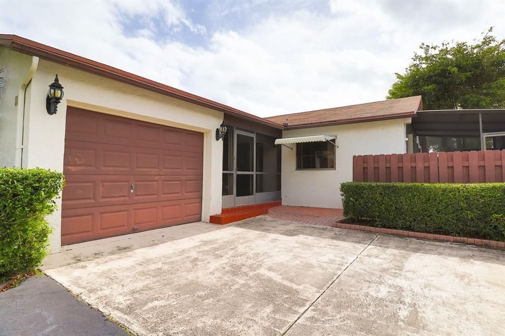 Photo of 5086 Mirror Lakes Boulevard, Boynton Beach, FL 33472 (MLS # F10538439)