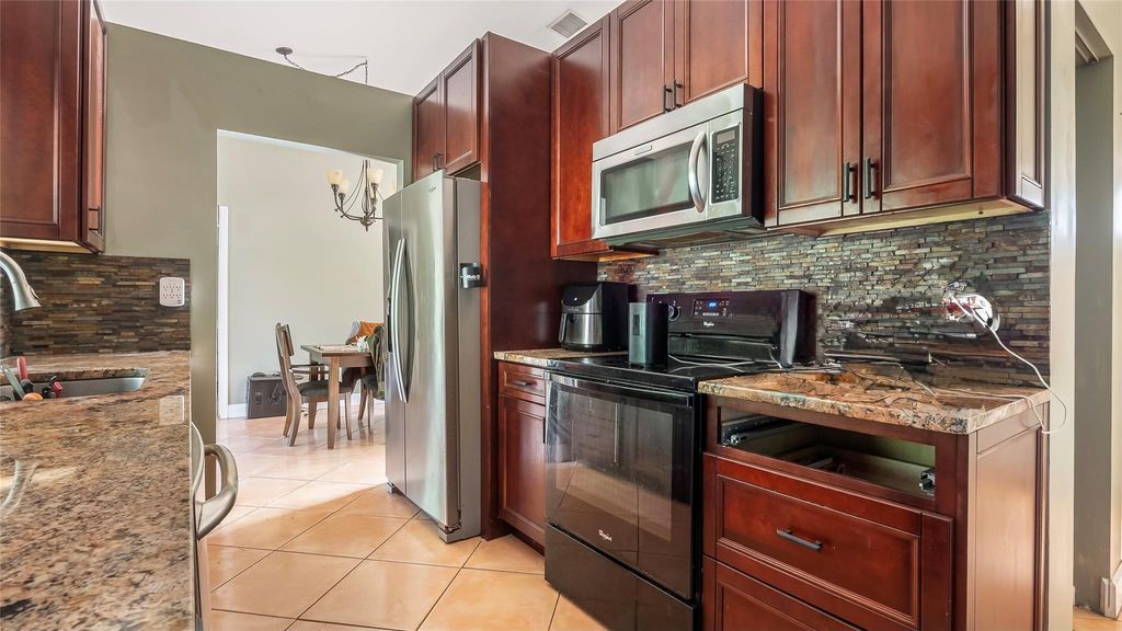 Photo of 2881 NW 98th Way, Coral Springs, FL 33065 (MLS # F10536636)