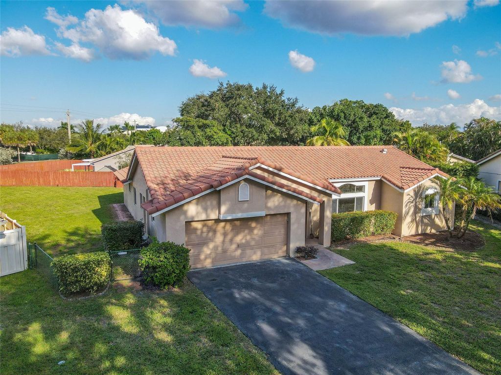 Photo of 2881 NW 98th Way, Coral Springs, FL 33065 (MLS # F10536636)