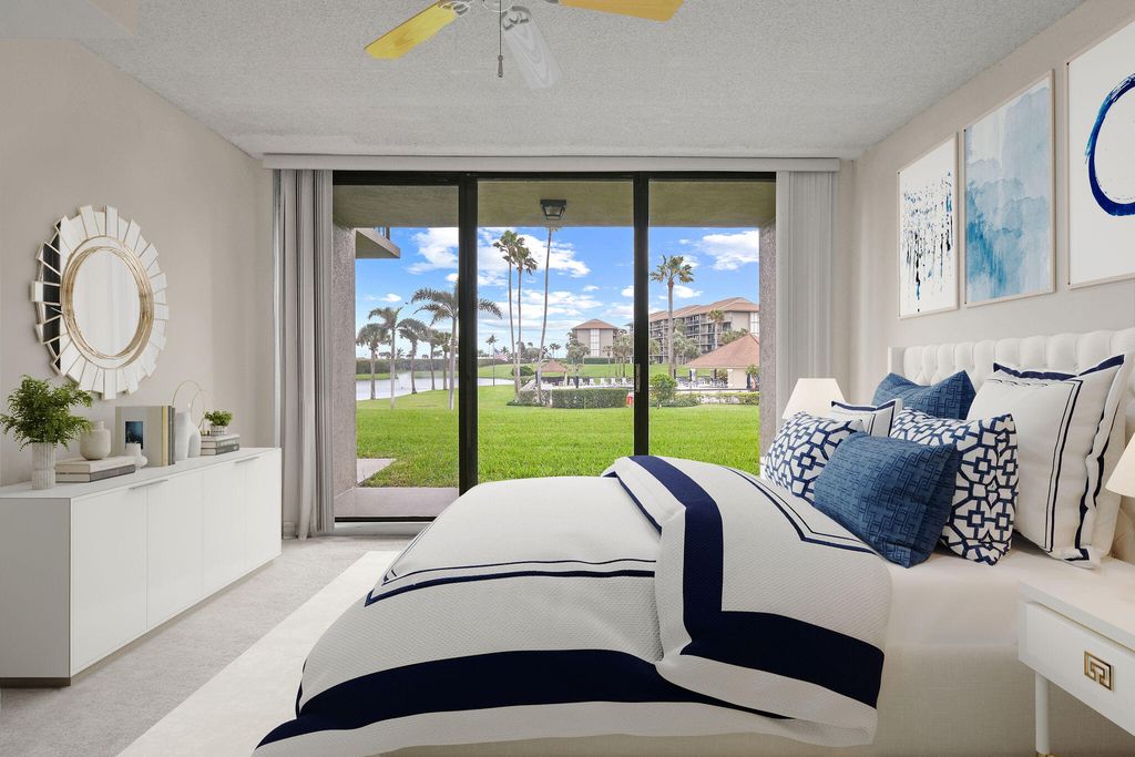 Photo of 301 S Seas Drive #104, Jupiter, FL 33477 (MLS # R11057566)