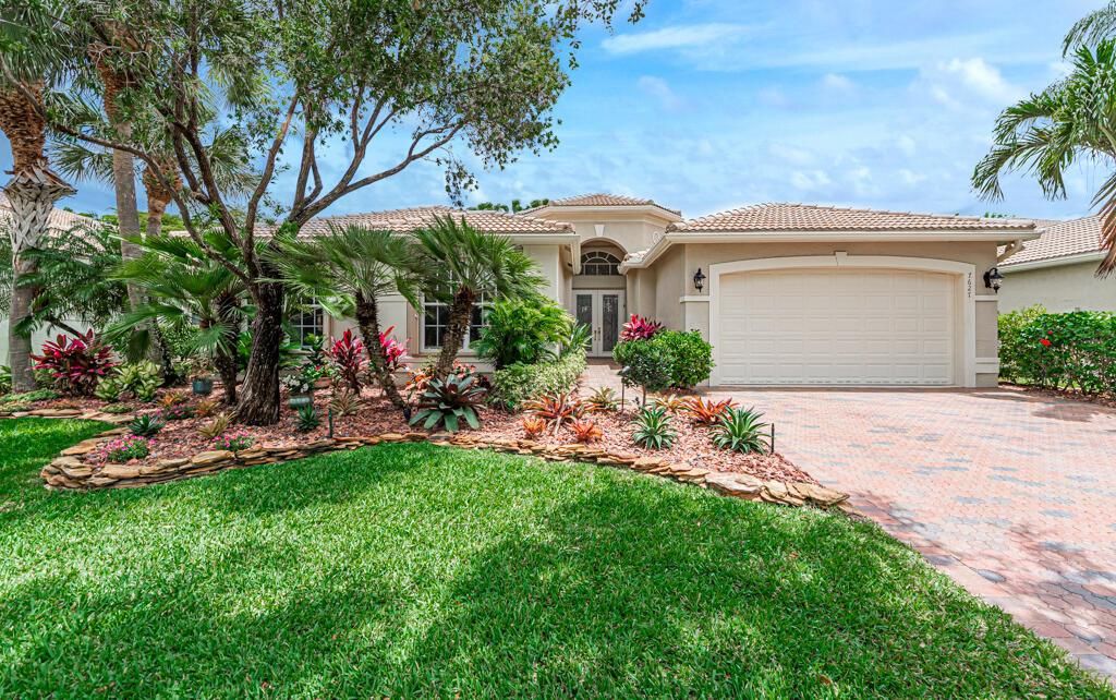 Photo of 7627 Tarpon Cove Circle Cir, Lake Worth Beach, FL 33467 (MLS # R10717566)