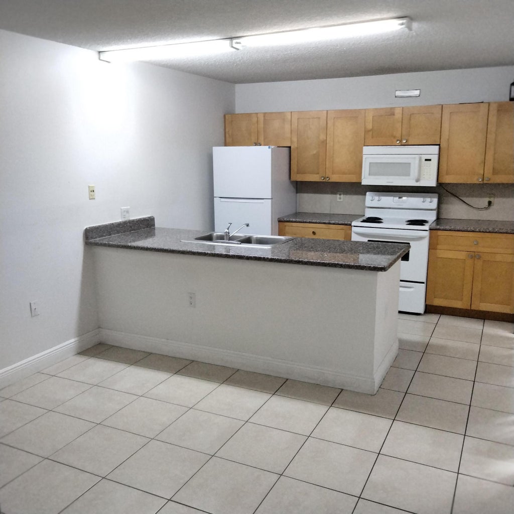 Photo of 729 Mill Valley Place, West Palm Beach, FL 33409 (MLS # B26048717)
