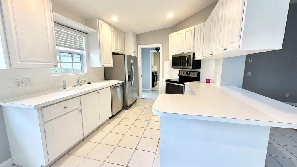 Photo of 7157 Grassy Bay Drive, West Palm Beach, FL 33411 (MLS # R11015971)