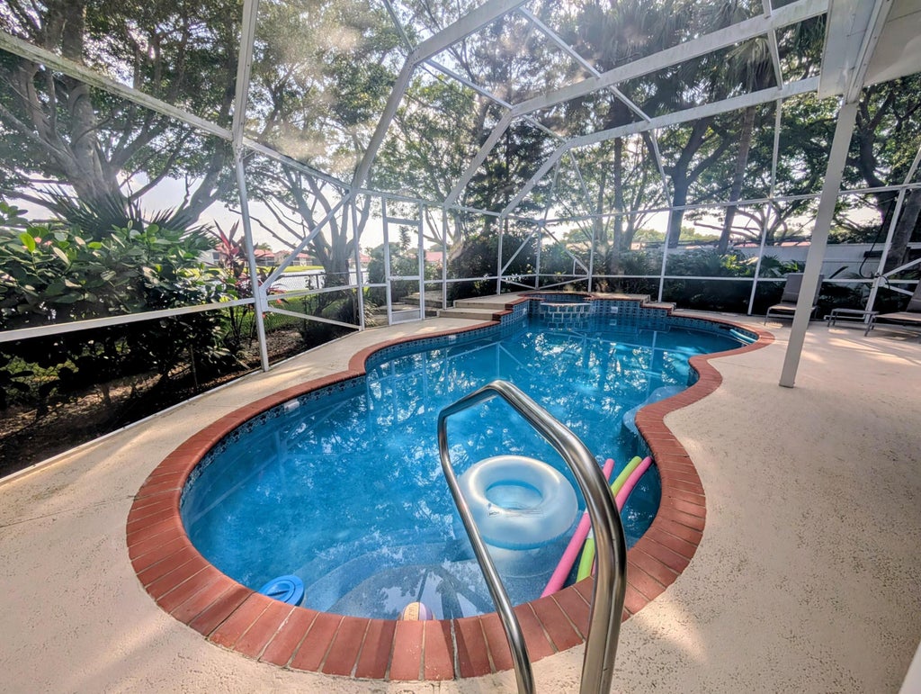 Photo of 7628 Eagle Point Drive, Delray Beach, FL 33446 (MLS # B26056976)