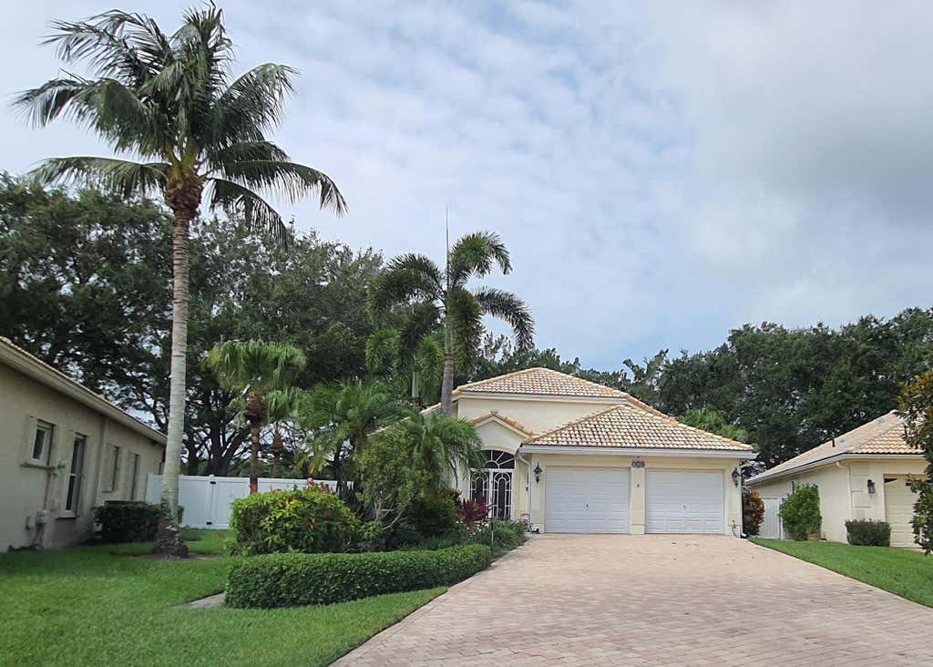 Photo of 7628 Eagle Point Drive, Delray Beach, FL 33446 (MLS # B26056976)