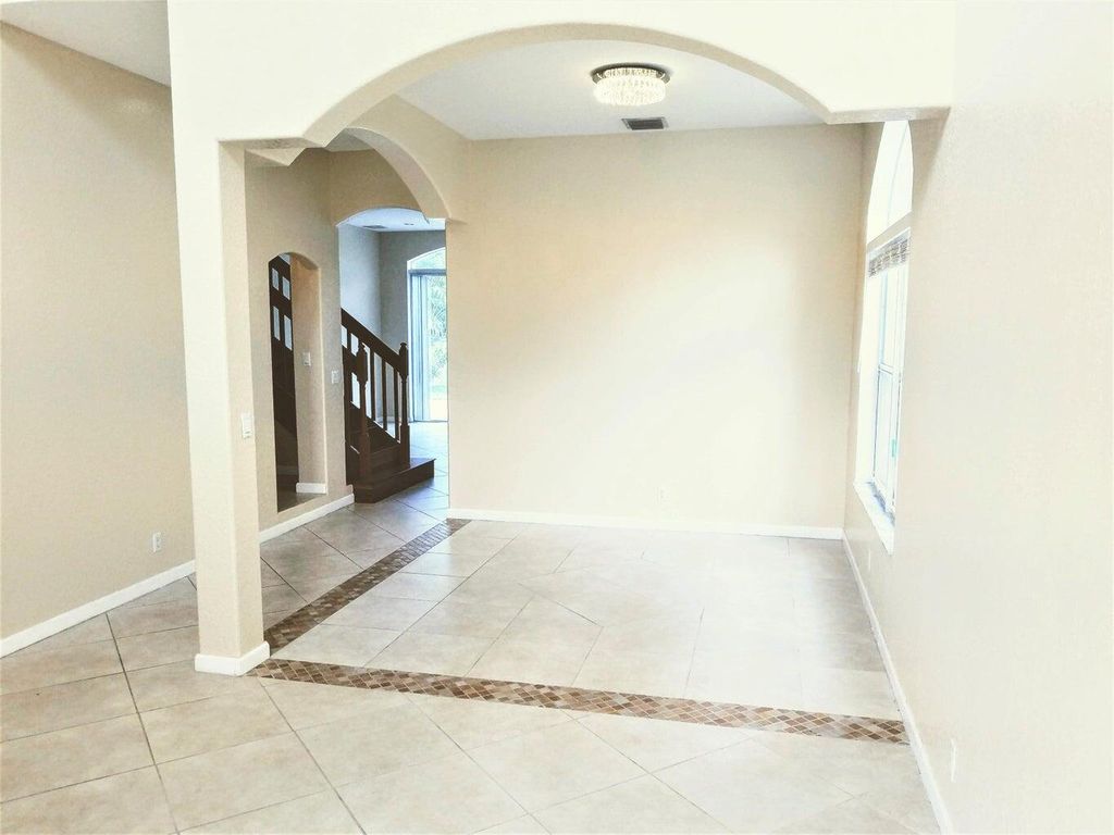 Photo of 1171 W Magnolia Circle, Delray Beach, FL 33445 (MLS # R11006776)