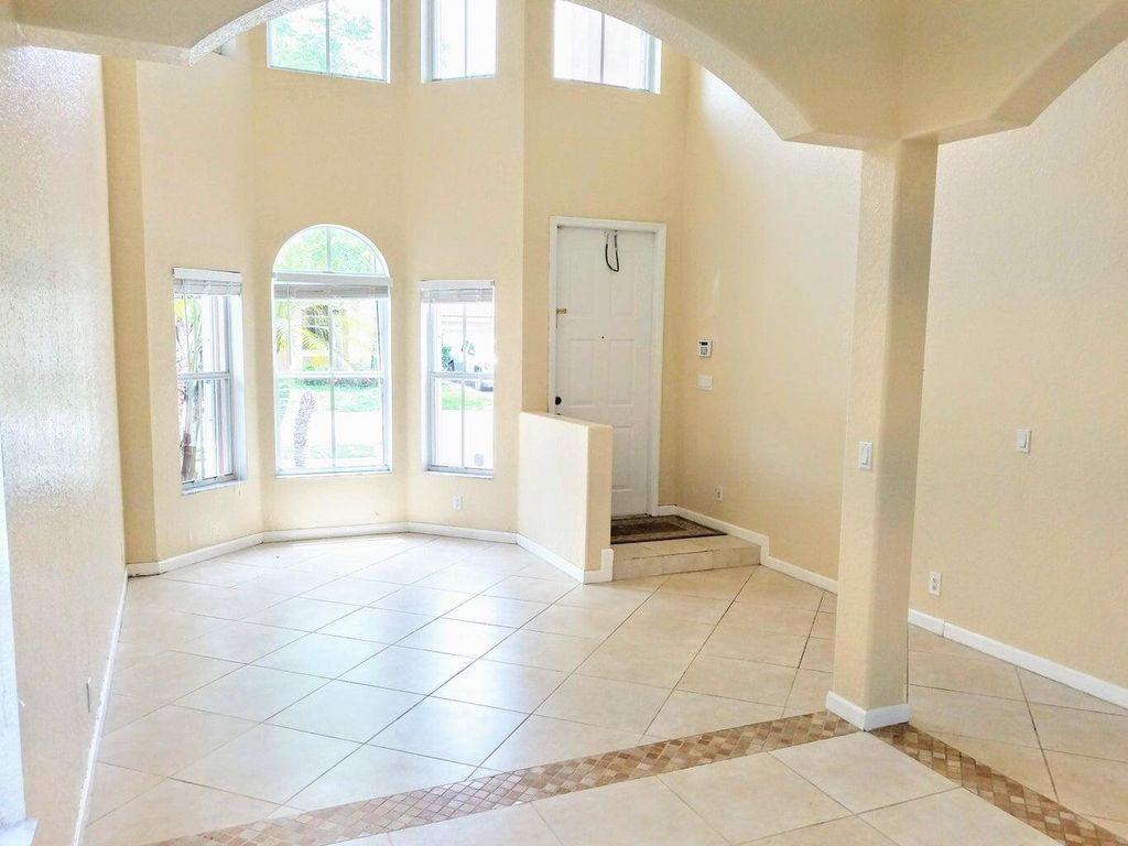 Photo of 1171 W Magnolia Circle, Delray Beach, FL 33445 (MLS # R11006776)