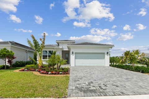Photo of 10118 Driftwood Way, Palm Beach Gardens, FL 33412 (MLS # B26023386)