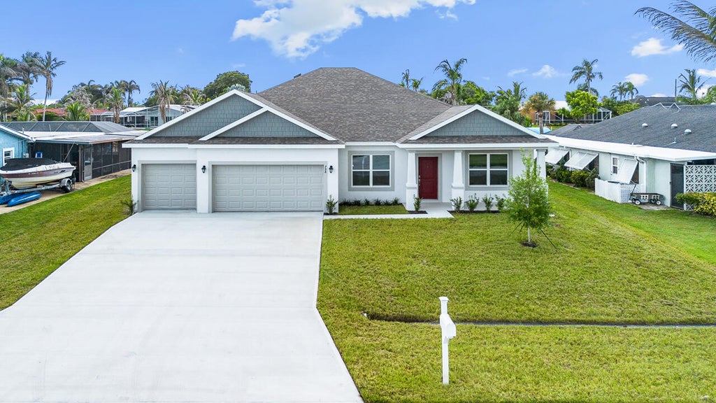 Photo of 798 SE Seahouse Drive, Port Saint Lucie, FL 34983 (MLS # B26063818)